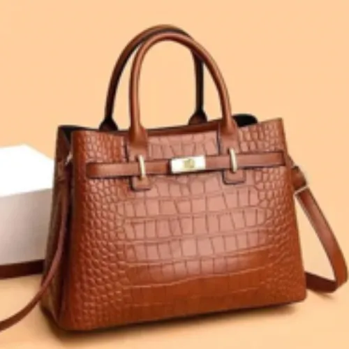 Premium designer handbag in soft leather with gold hardware and elegant top-handle silhouette
