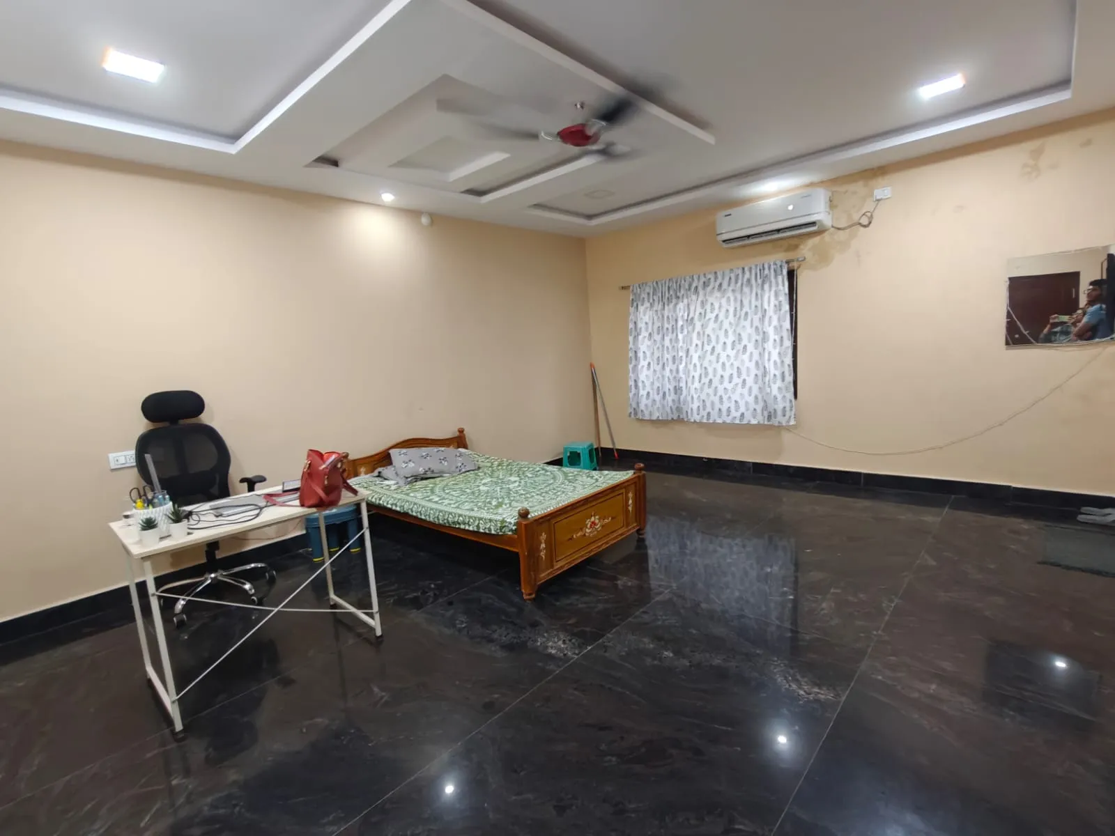 Before: cluttered and dark living room