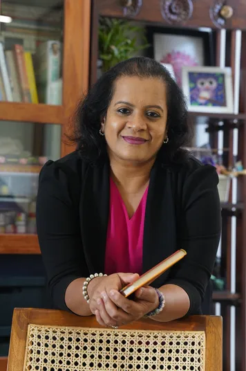 Ranjitha Nagan smiling in a natural setting