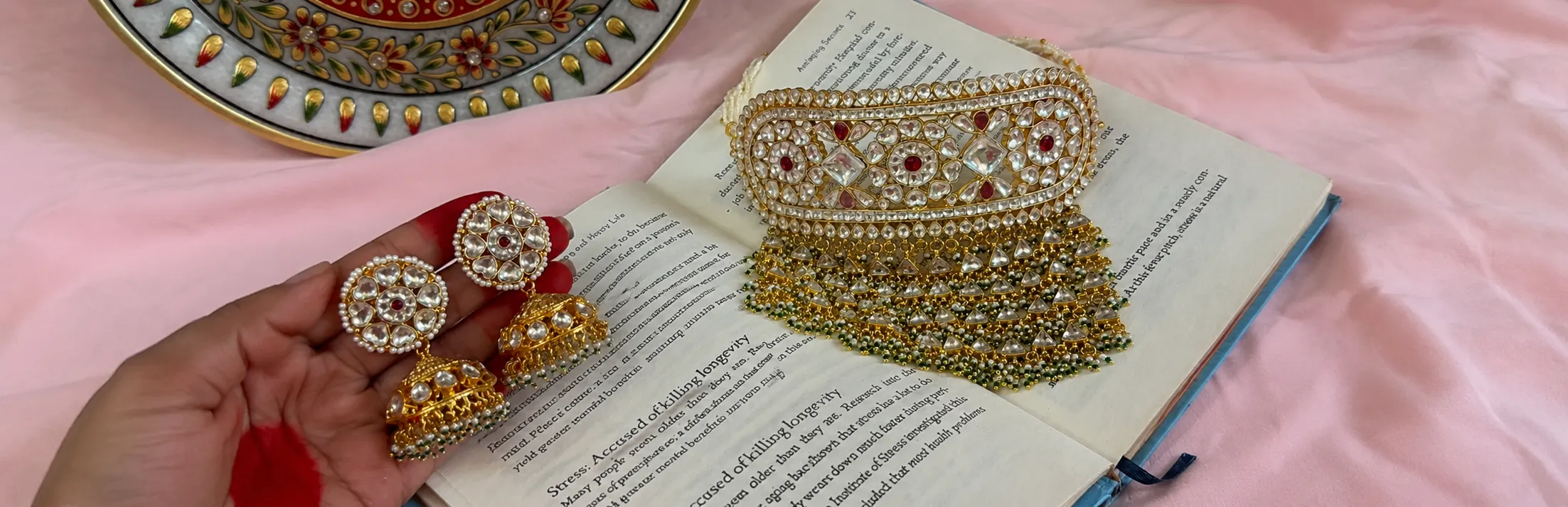 Elegant traditional Kundan necklace and earrings set with blue gemstones, perfect for cultural events.
