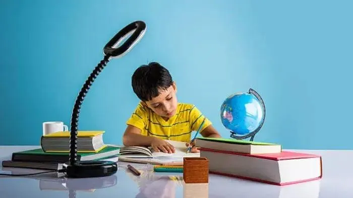 Student using a planner and notes to build smart study habits