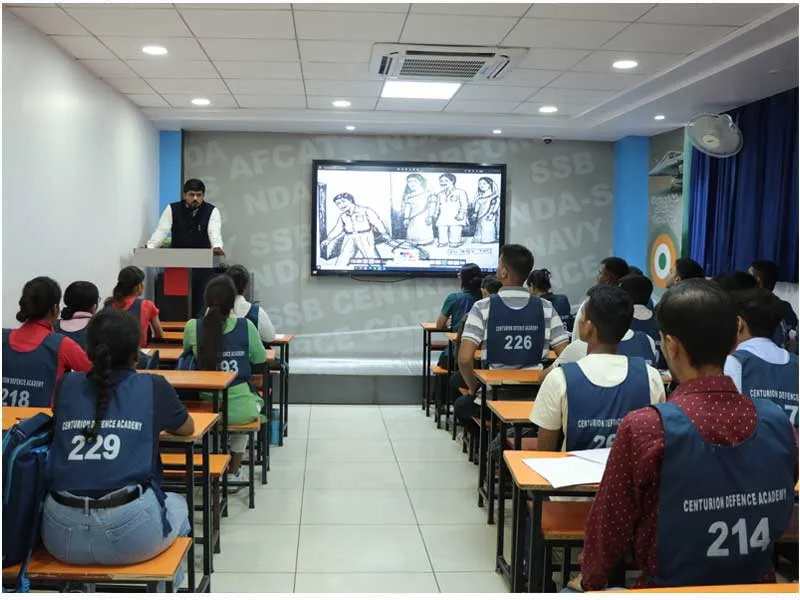 Two young adults engage in study at a sunlit table, creating a serene learning environment.