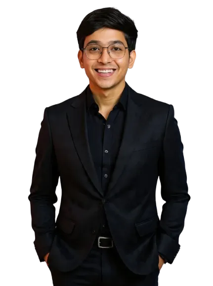 Portrait of a confident businessman holding papers in formal attire inside an office